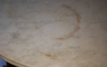 How to remove stain from marble table top?