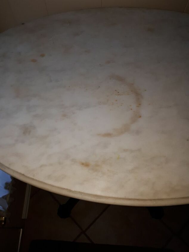 Removing stains from marble table top Removing stains from marble table top
