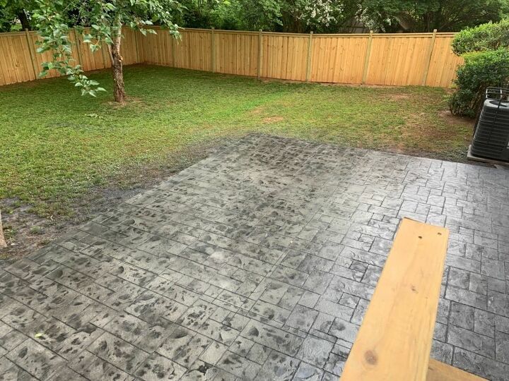 q correct black spots on stamped concrete