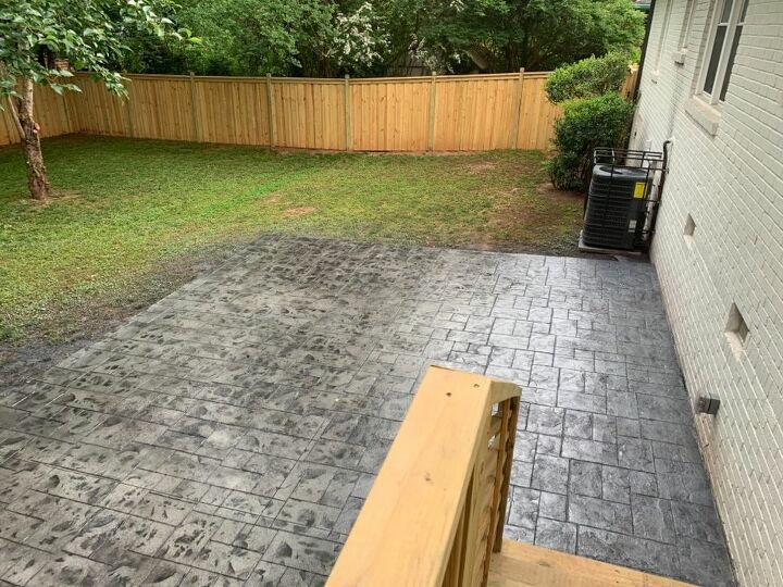 q correct black spots on stamped concrete