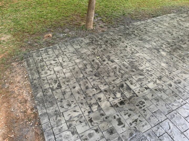 q correct black spots on stamped concrete
