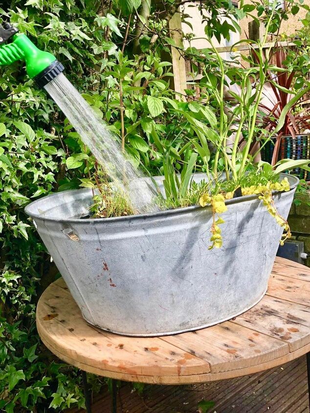 cute little diy old tub pond, Top up with hose