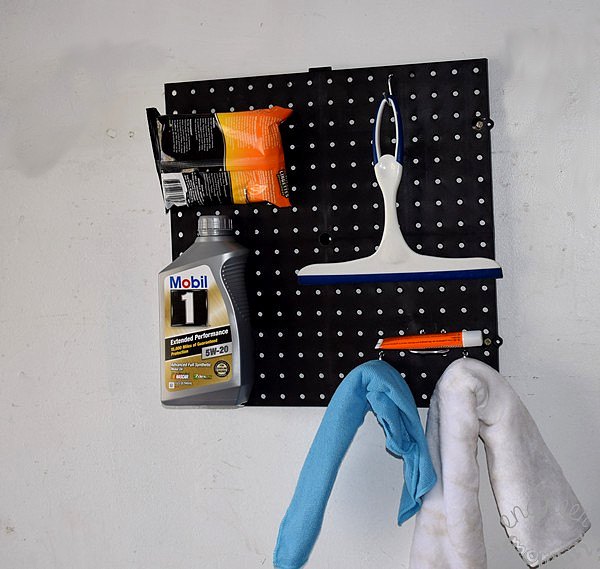 18 practical yet stylish diy pegboard ideas for the home, Handy Pegboard Hooks for Car Care Supplies