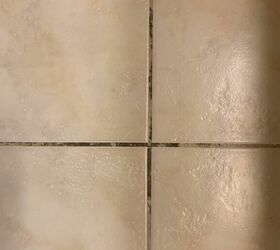 q cleaning dirty floor tile grout