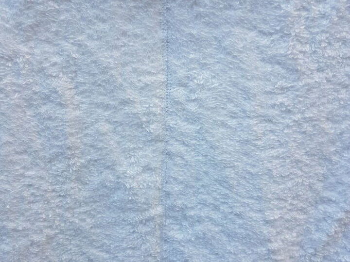 q suggestions on repairing a bath towel with a thin line off centre