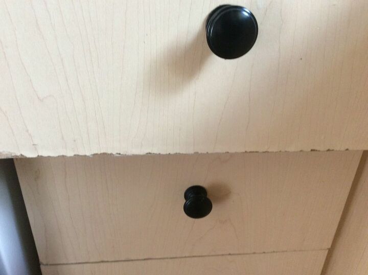 repairing chipped laminate cabinet edges with color matched putty
