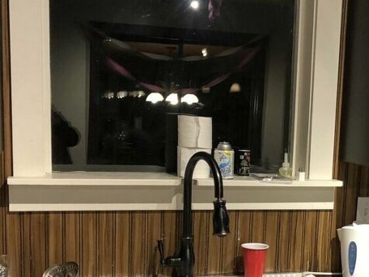 q what to do with kitchen window that looks into the garage