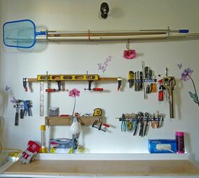 old metal shelf becomes new work bench, Wall hooks to organize