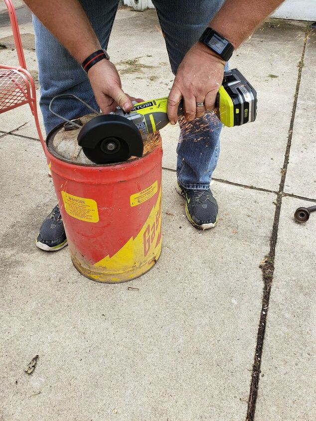 how to easily make cute diy planters out of vintage gas cans, Cutting the top off the gas can