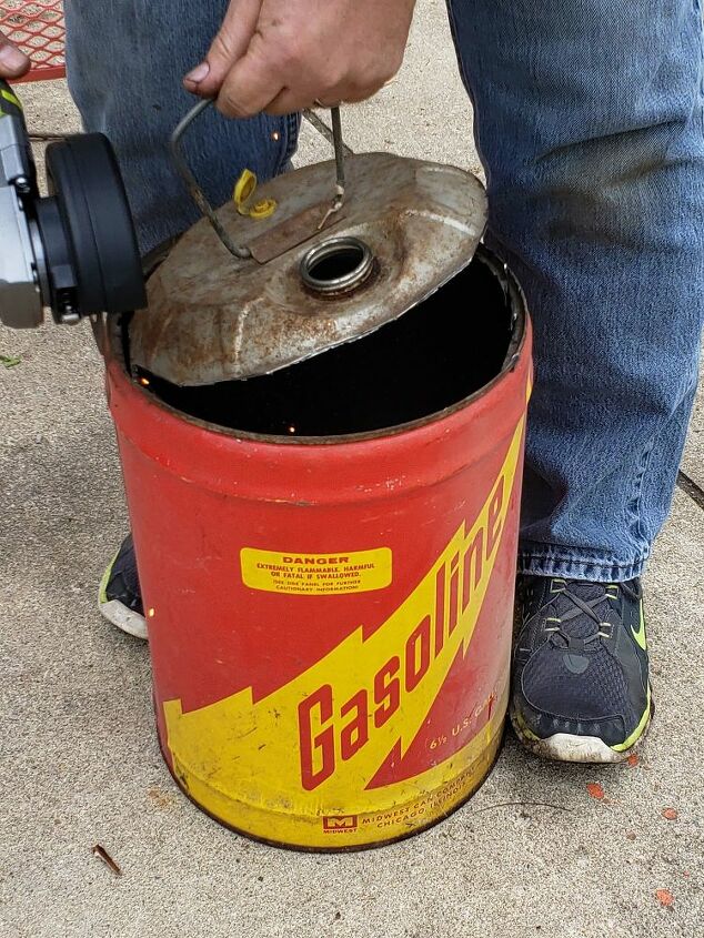 how to easily make cute diy planters out of vintage gas cans, Taking the top off the gas can