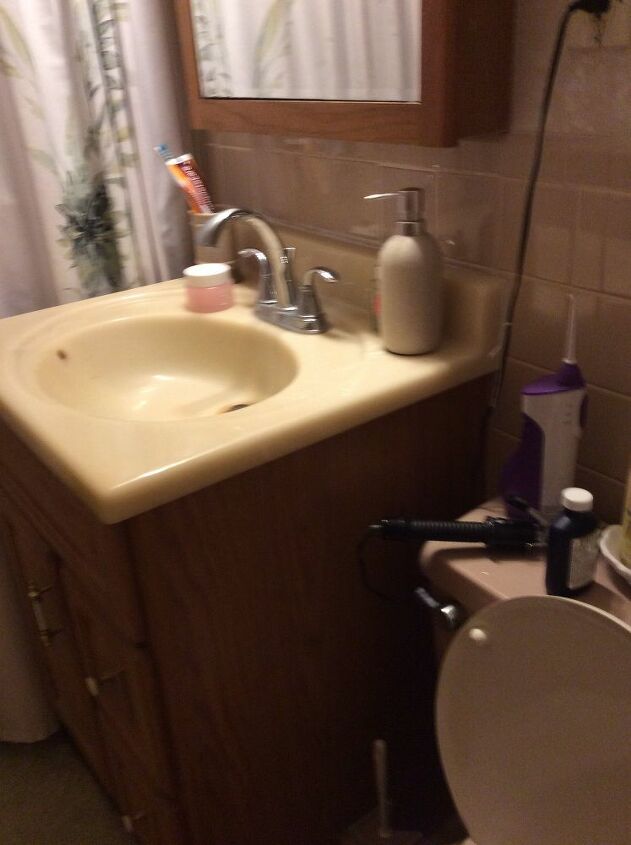 q how can i update a faux oak vanity my bathroom has pinky beige tile