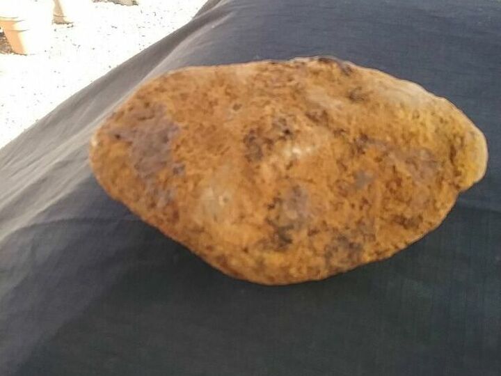 q how do you remove rust from rock