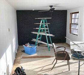painted brick room makeover in our flip house