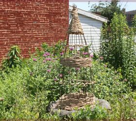 wicker style garden obelisk from a tomato cage