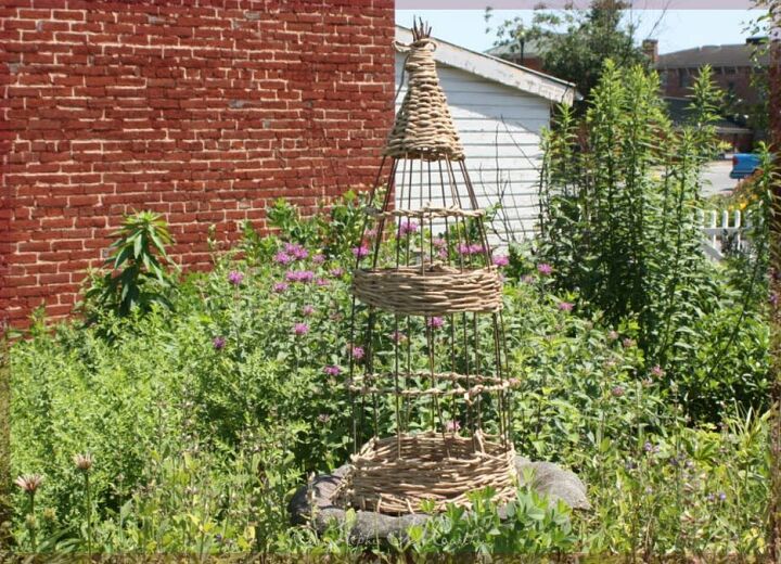 wicker style garden obelisk from a tomato cage