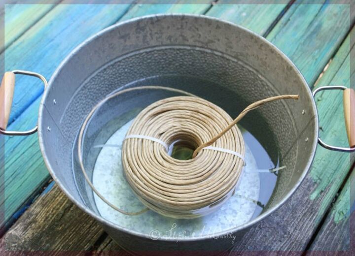 wicker style garden obelisk from a tomato cage