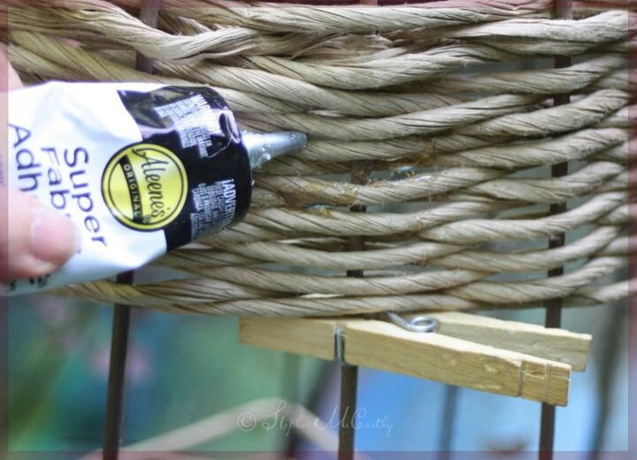 wicker style garden obelisk from a tomato cage