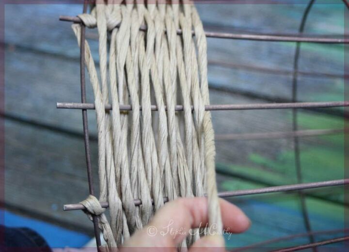wicker style garden obelisk from a tomato cage