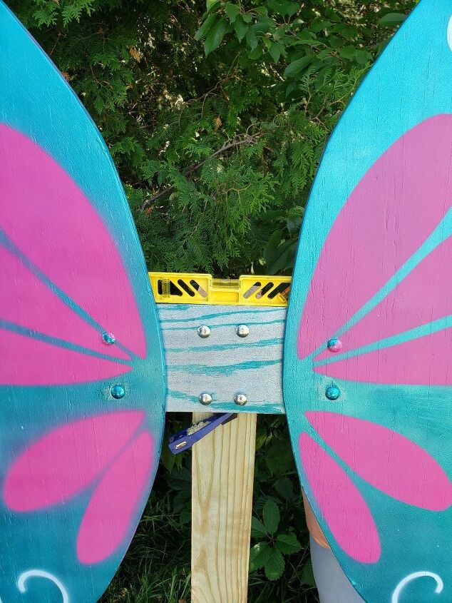 how to make life size fairy wings for a cute garden feature, Attaching the wings to a post