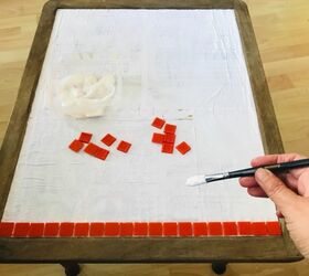 how to funk up an old thrift store find with glass mosaic, Sticking vitreous glass tiles to table top