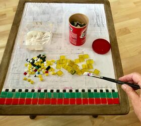 how to funk up an old thrift store find with glass mosaic, Use PVA glue to stick tiles onto table top