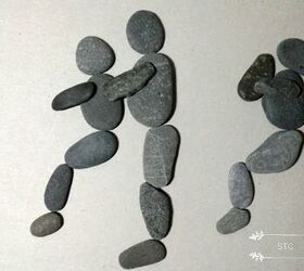 family portrait made with pebbles and driftwood
