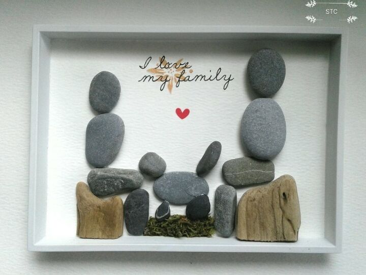 family portrait made with pebbles and driftwood