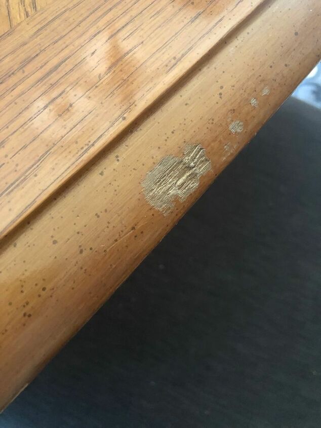 how can i fix a wooden dining room table with bite marks on it