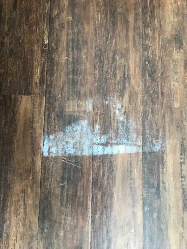 q how do i remove a water spot from wood flooring