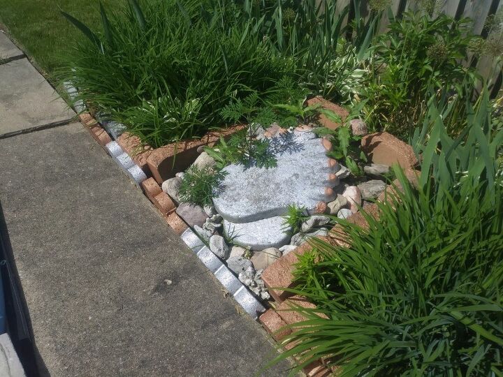 q how can i incorporate bricks and rocks in my flower garden