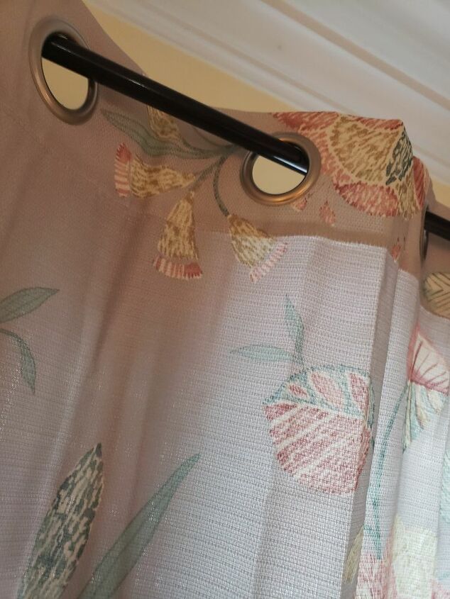 how can i make a skinny rod and grommet curtains combo look better