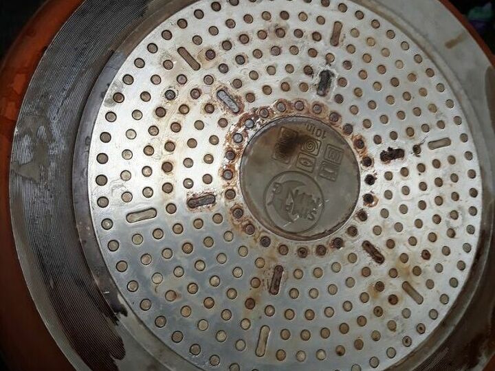 q how do i get the stains off of the bottoms of my copper pots and pans
