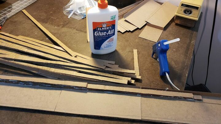 craft room makeover extreme upcycling cardboard baseboard and trim