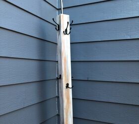 repurposed wooden spool to towel and table rack, Added a solar light and black hooks