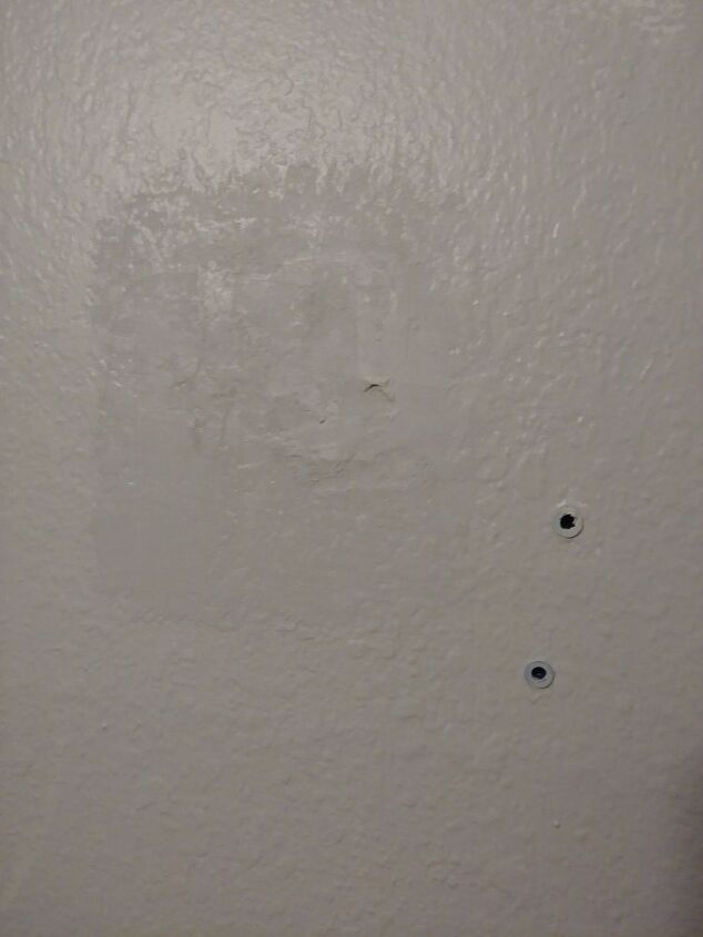 how can i fix this very noticeable patch job on my bathroom wall