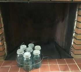 q how can i decorate my fireplace with antique blue mason jars