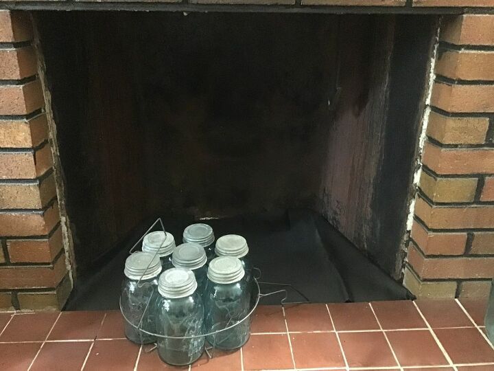 q how can i decorate my fireplace with antique blue mason jars