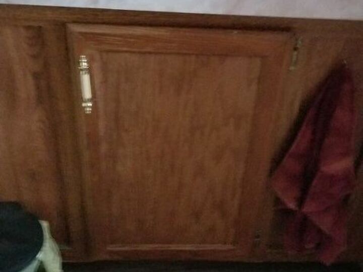 q how do i open up a small undersink bathroom cabinet