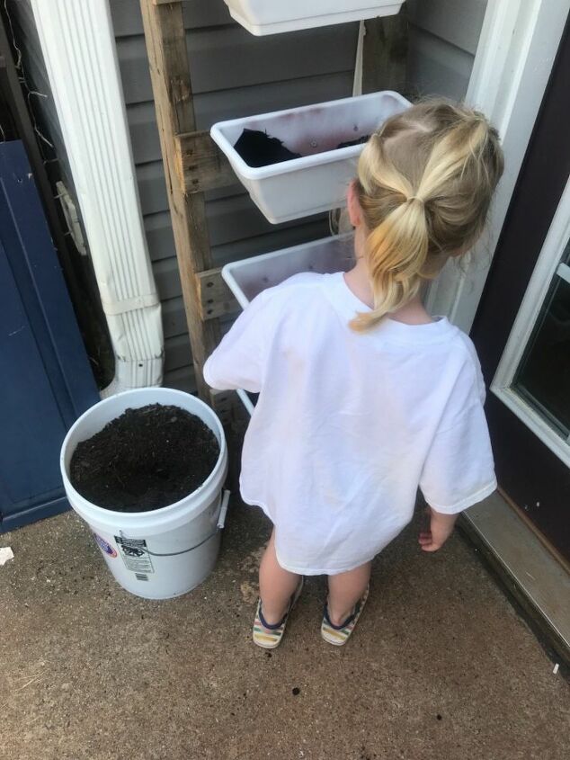 ladder herb garden, I recruited a little helper for the lower pot
