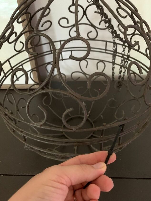 quick and easy diy indoor outdoor light, Attach the Baskets