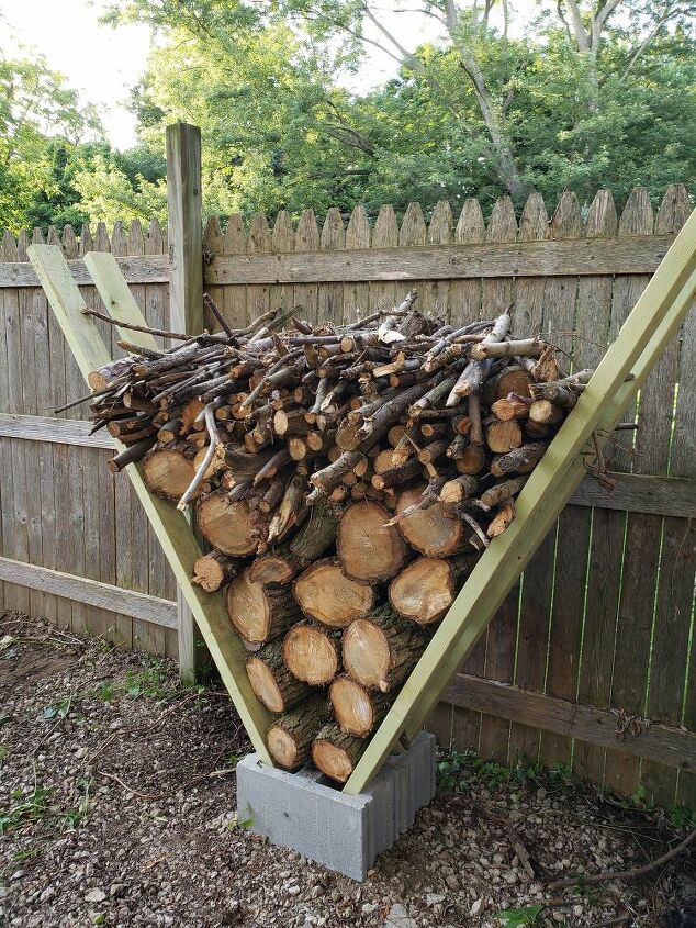 how to easily make a v shaped diy cinder block firewood rack, DIY cinder block firewood rack