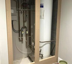 how to hide an ugly electric water tank, The frame around the tank