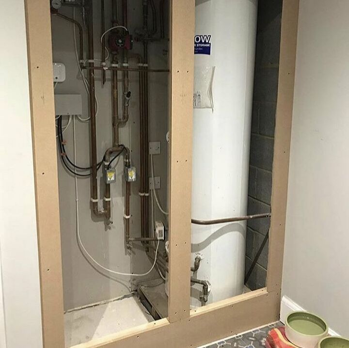 how to hide an ugly electric water tank, The frame around the tank