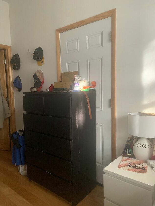 how can i cover up an ugly door in a rental apartment