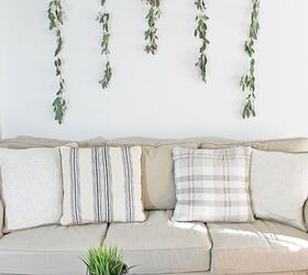 s 15 ways unexpected items are making these walls really stand out, A branch with hanging eucalyptus