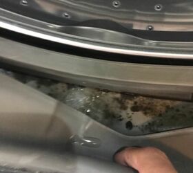 how do i clean the black mold on the rubber of my washing machine