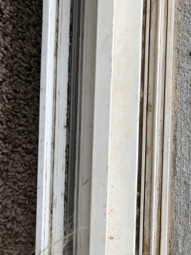 making smooth moving windows patio door, Left crevice is dirty Right side cleaned wit