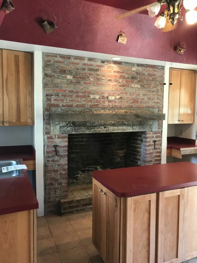 what can we do with this old fireplace in the kitchen pic