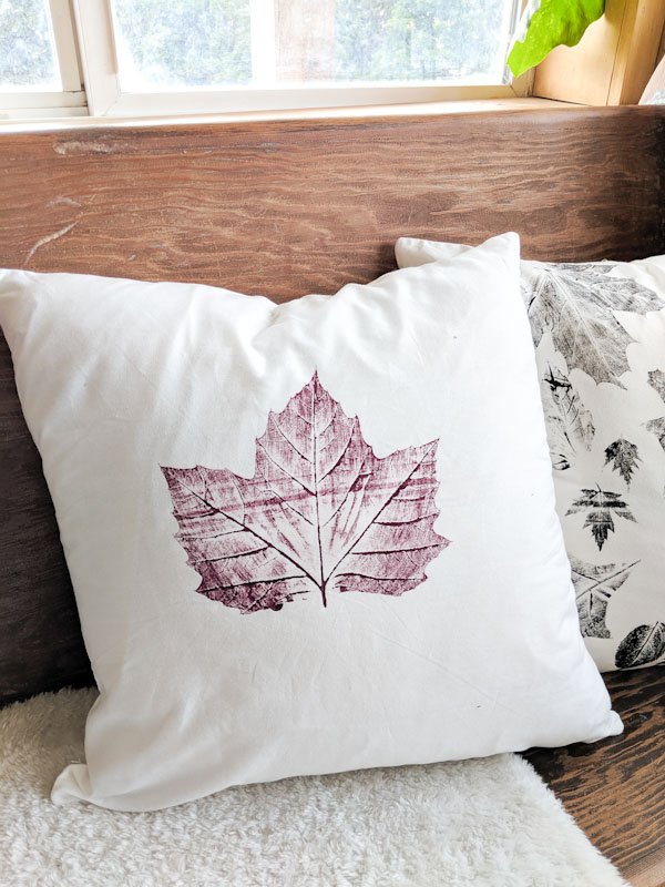 diy fall decor throw pillows stamped with leaves