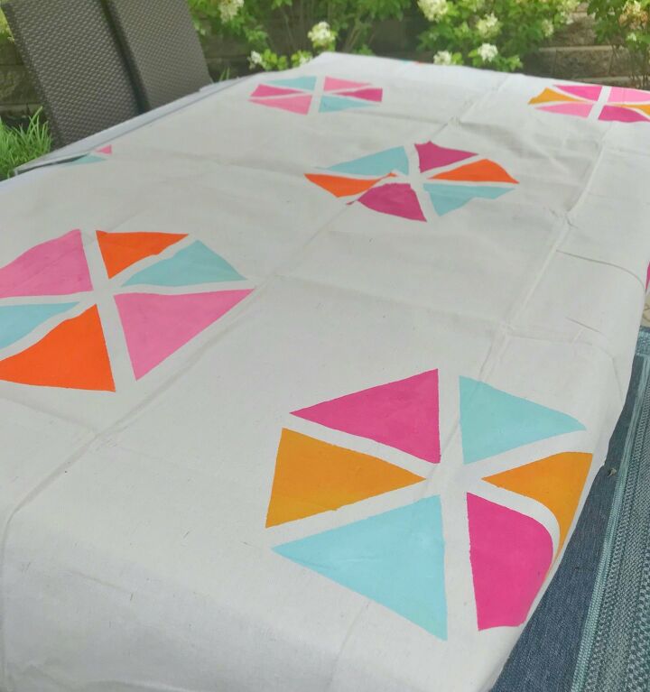 s 19 ways to use a drop cloth that you ve probably never thought of, Stencil a drop cloth for this cute outdoor tablecloth